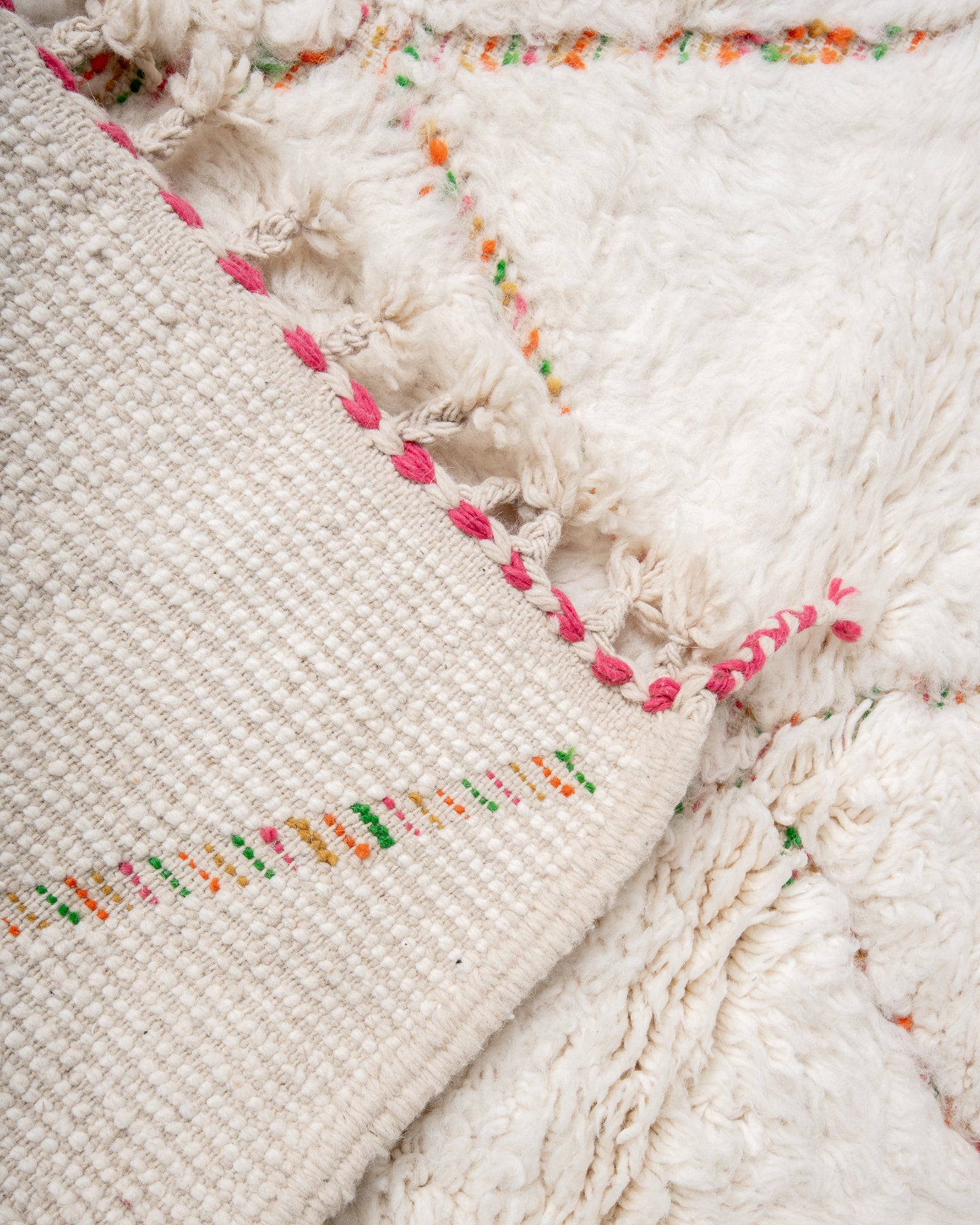 Modern, designer, handcrafted Berber rug from Morocco. Beniourain carpet with beautiful colours and patterns and fluffy wool texture.
